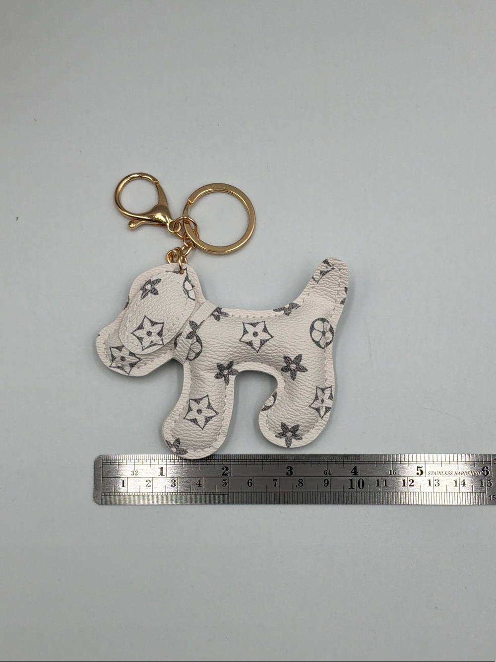 Designer Inspired White Puppy Keychain with Gold Hardware - Picture 2 of 3